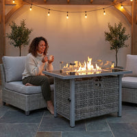 43 In. Propane Gas Fire Pit Table, 60000 BTU Rectangular Open Weave Wicker Fire Pit with Glass Wind Guard in Gray — Lifestyle