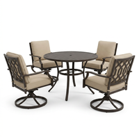 5-Piece Metal Outdoor Dining Set with Beige Cushions and Swivel Dining Chairs — Studio Shot