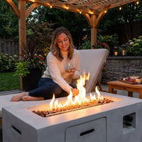 Concrete Outdoor Propane Fire Pit Table, 50,000 BTU Square Gas Fire Table with Adjustable Flame, Lava Rocks, Weather-Resistant Design, and Protective Cover for Patio, Deck, or Backyard — Lifestyle